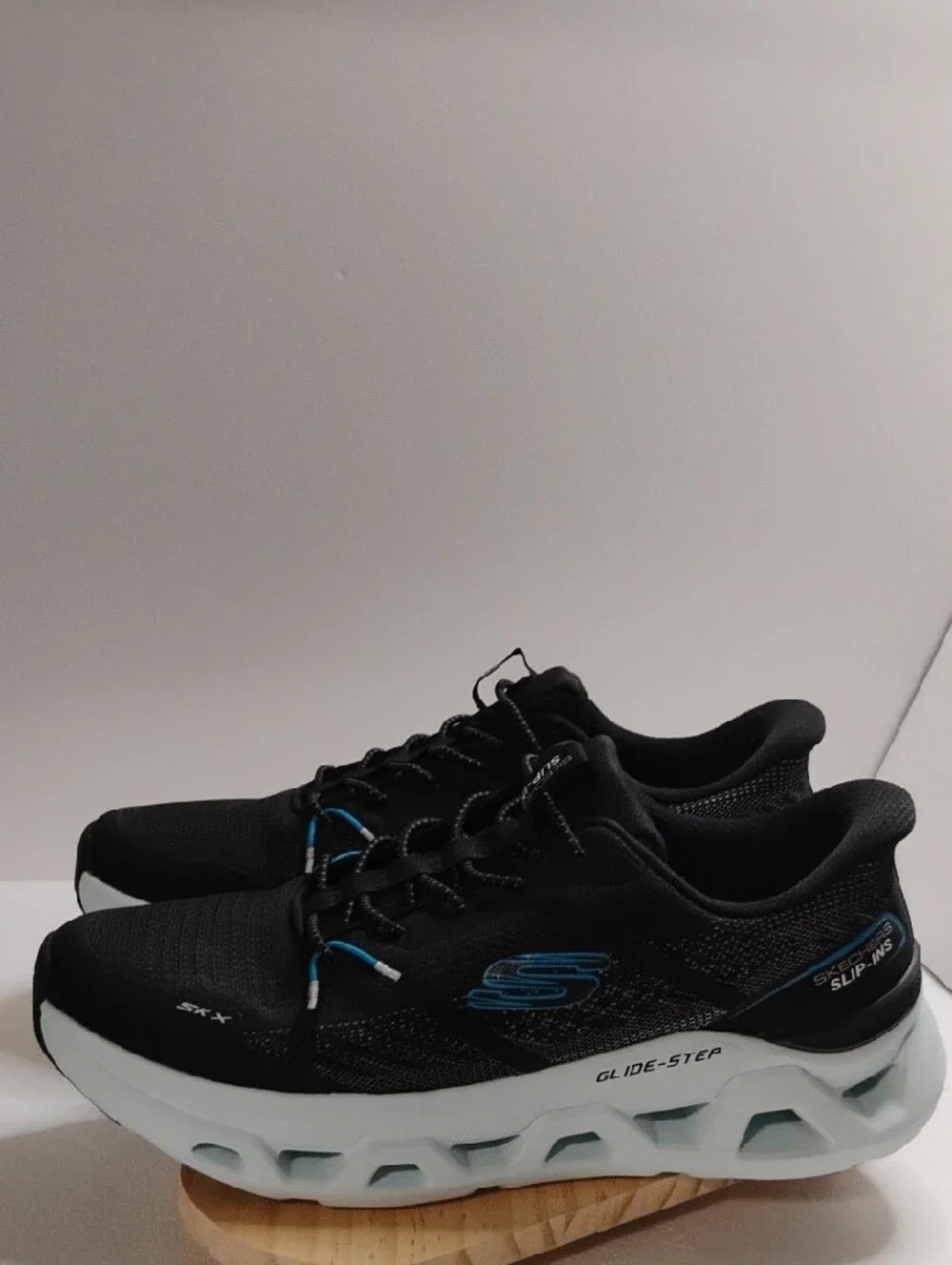 Skechers Men's Black Sneakers with Light Blue Accents